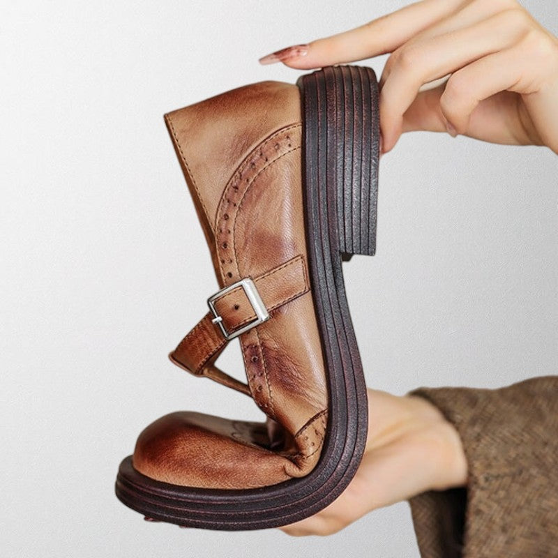 brown leather shoe with clasp women bending