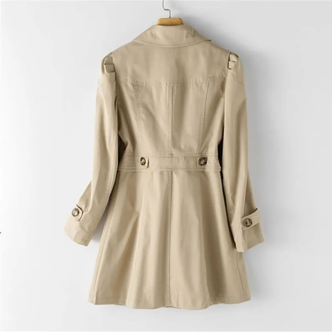 back view of khaki women’s classic waterproof trenchcoat