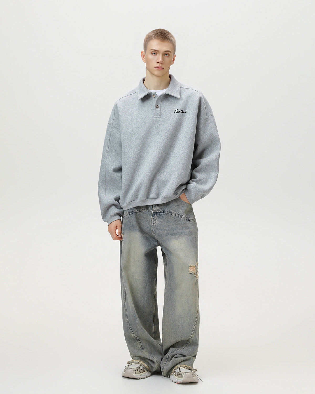 gray men’s oversized embroidered polo sweatshirt pose