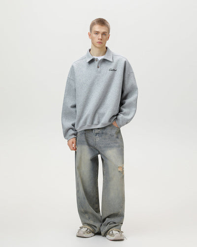 gray men’s oversized embroidered polo sweatshirt pose