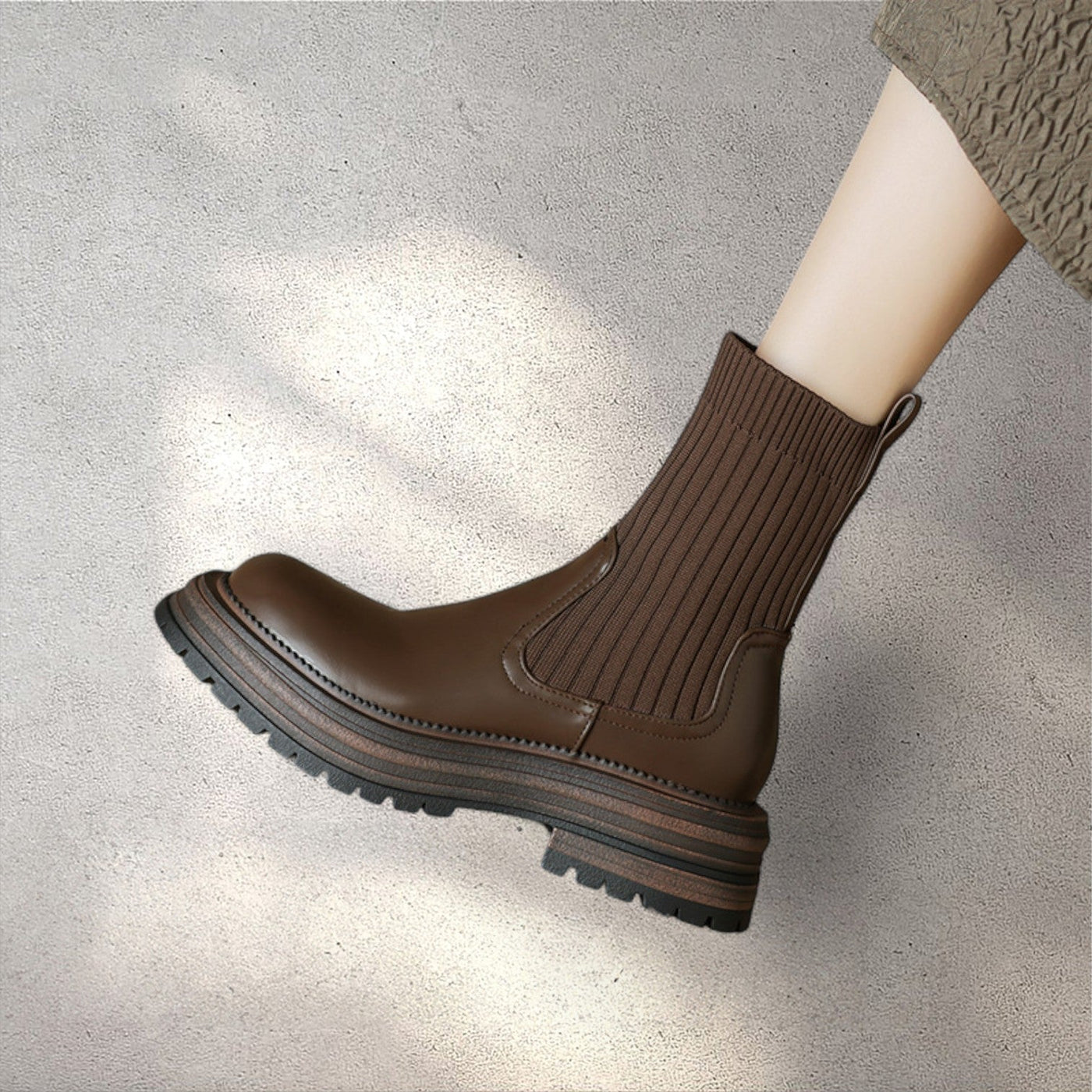 side view of brown leather knit boots women