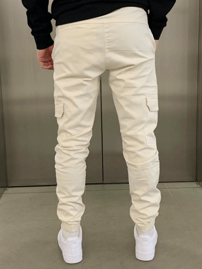 back view of beige men’s cargo jogger pants