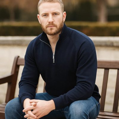posed view of blue mens cotton half-zip sweater