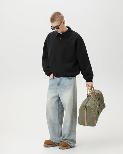 black men’s oversized embroidered polo sweatshirt pose