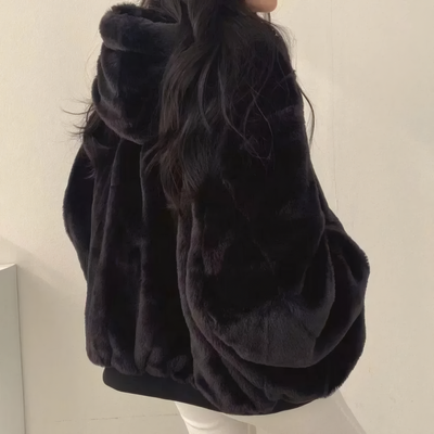 back view of black reversible hooded jacket women