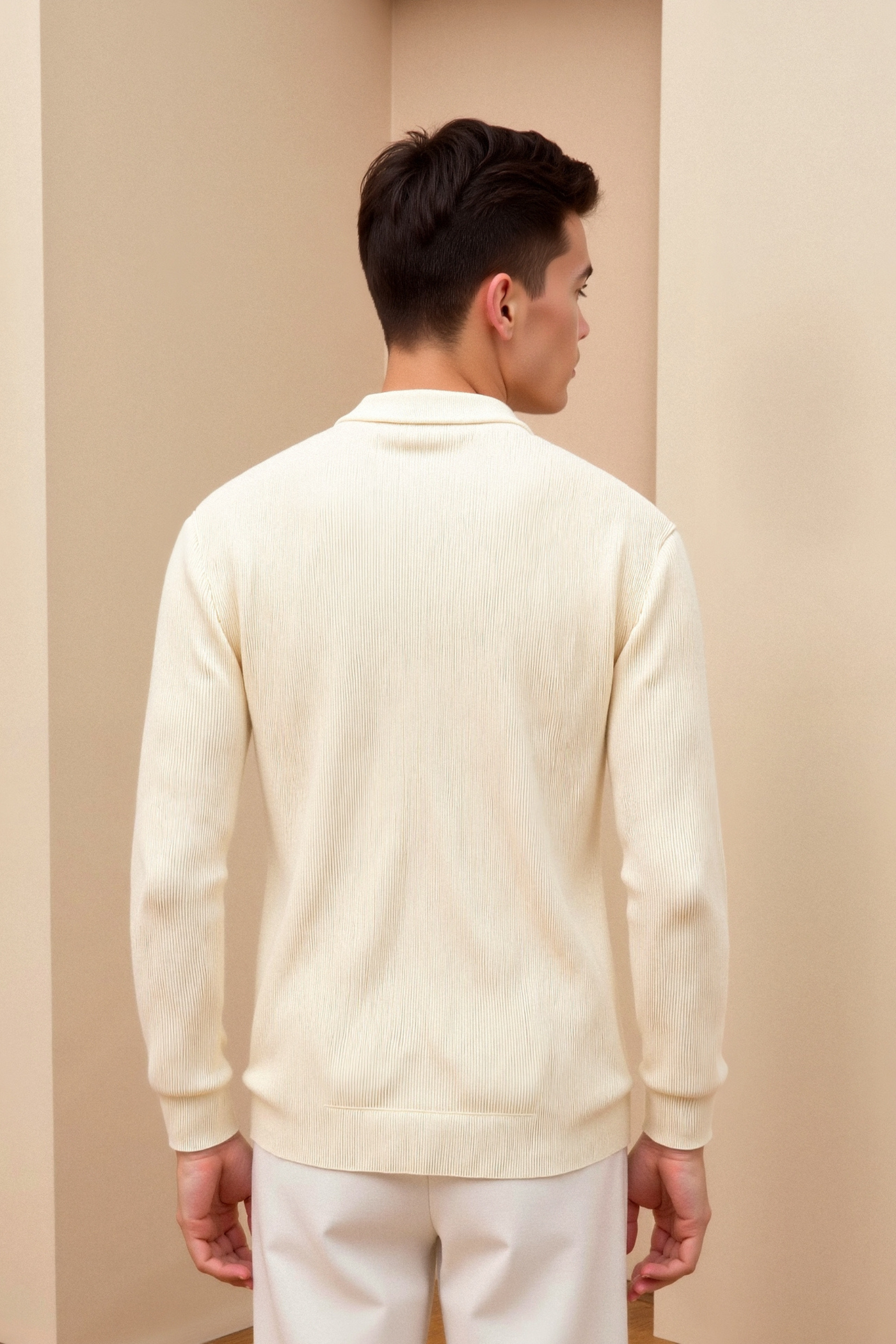 back view of beige solid knitted crew neck cardigan