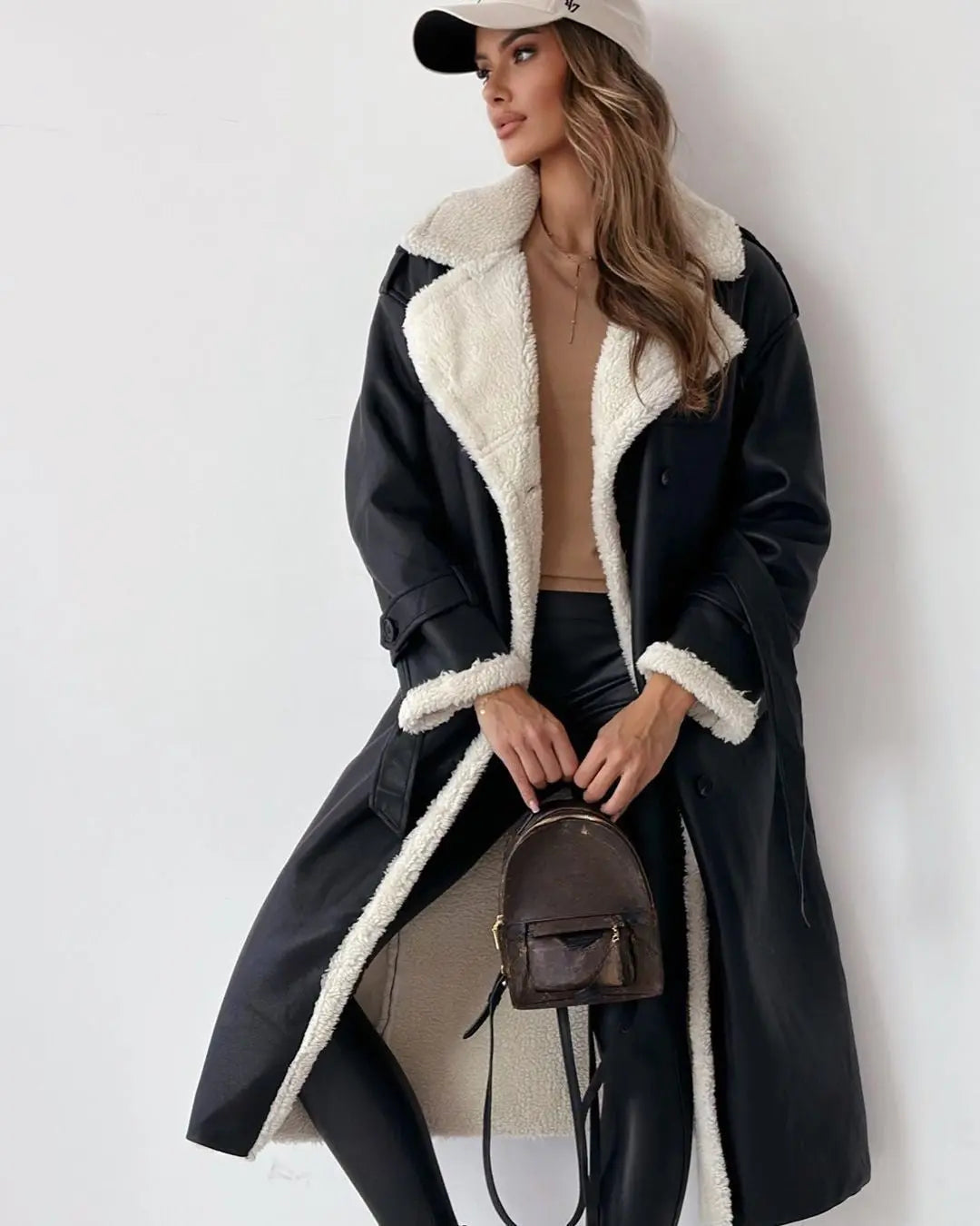 posed black teddy trench coat women