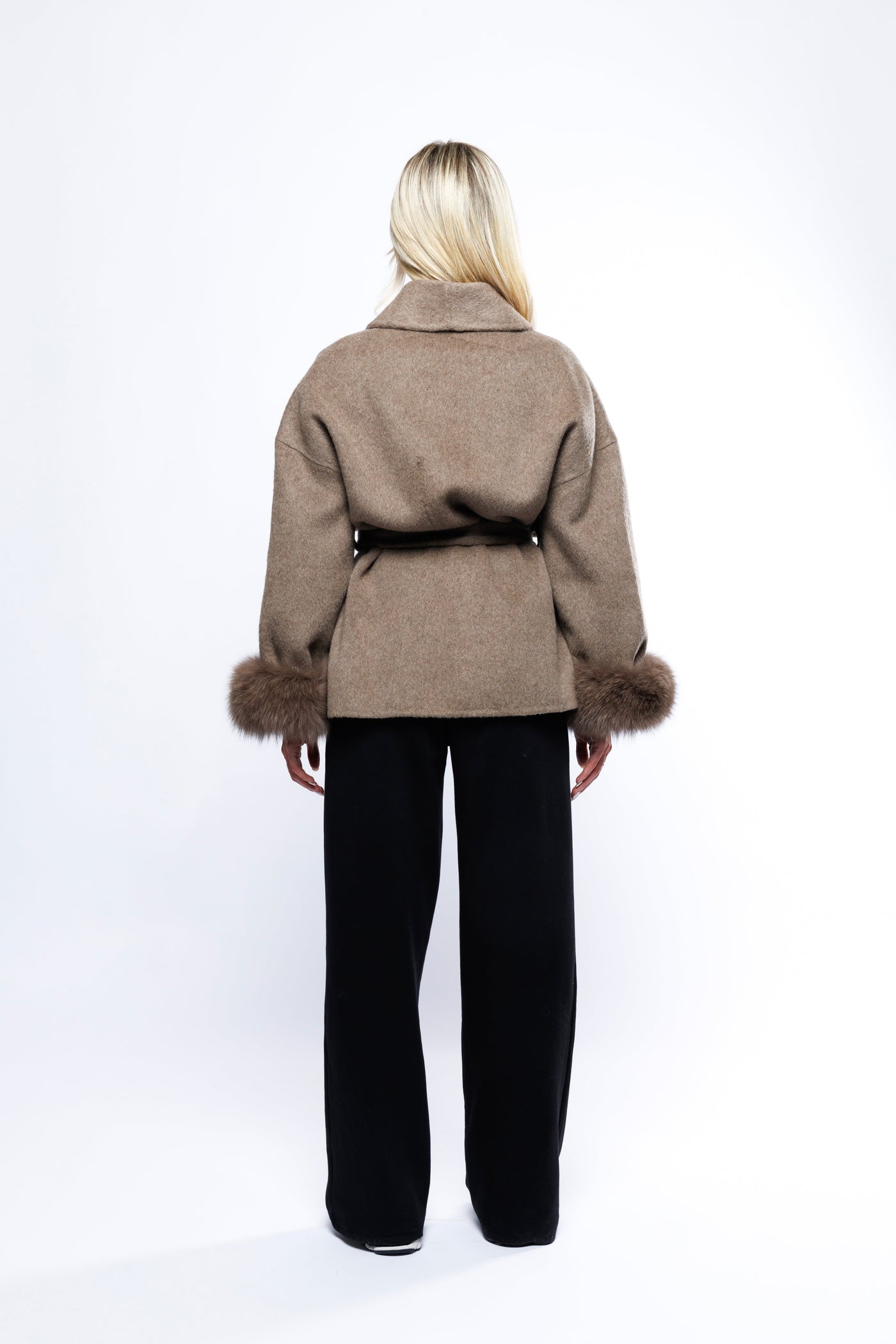 back view of light brown women’s belted wool-cotton coat