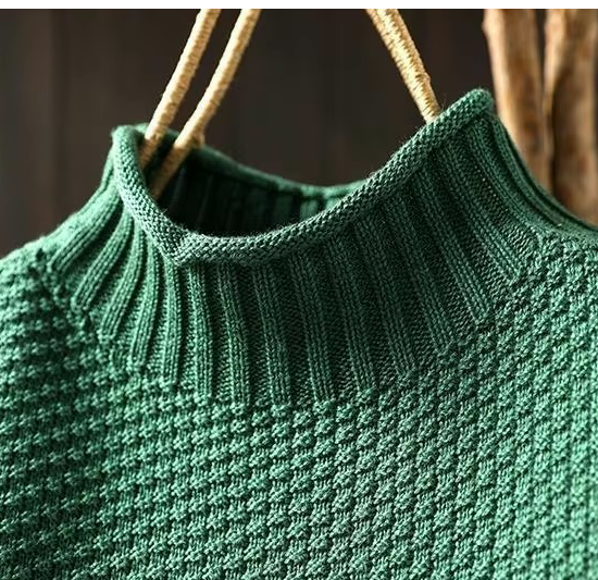 collar detail of green womens cashmere sweater