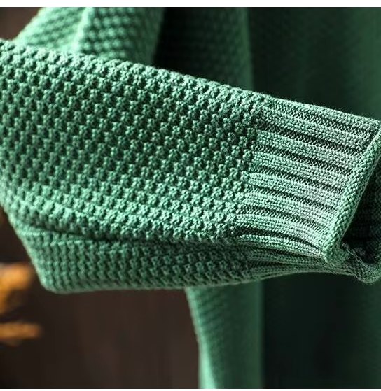 sleeve detail of green womens cashmere sweater