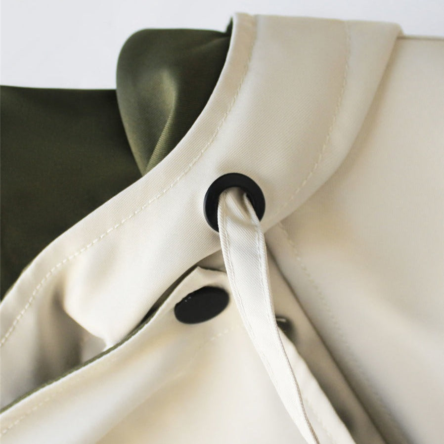 detail view of drawstring on women’s padded waterproof jacket