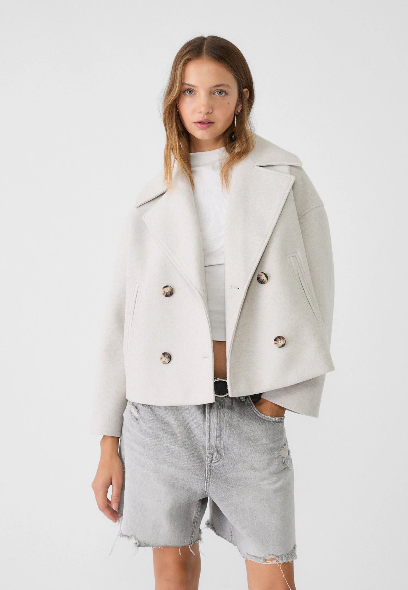 beige women’s short double-breasted faux-leather coat
